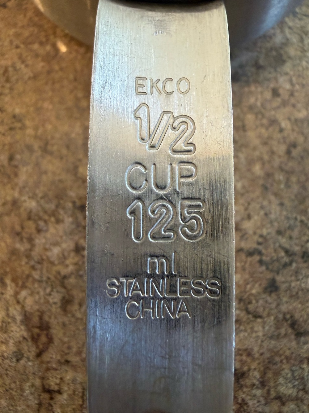 Vintage Ekco 1/2 cup stainless steel measuring cup